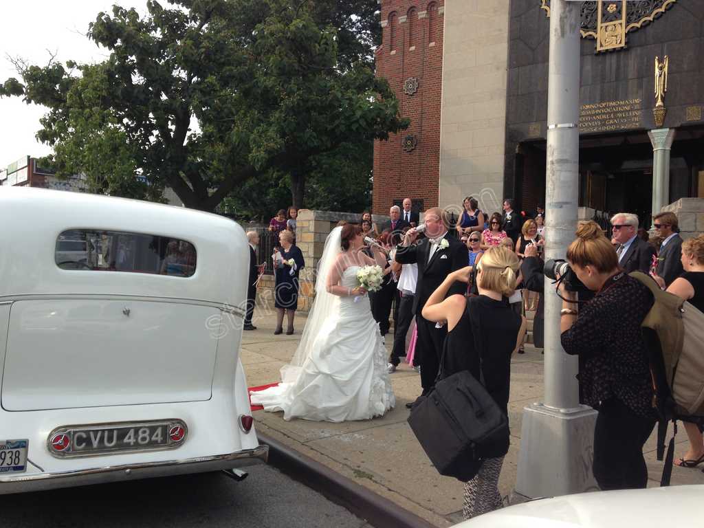 Rolls Royce Wedding Toast by Church in New York